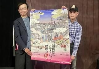 氷川竜介（左）と映画祭プログラムディレクターの数土直志氏