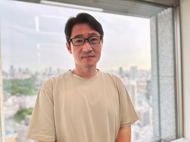 インタビューに応じた金山（キン・サン）氏／筆者撮影