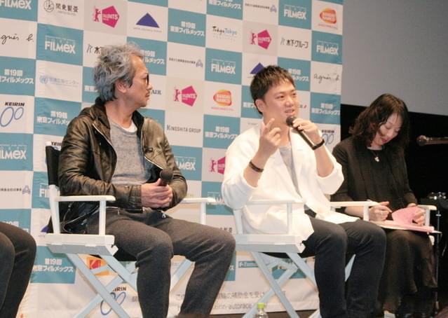 ヨー・シュウホァ監督(右)と浦田秀穂氏