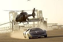 緑色のスーツを着ているのが サニー役のアラン・テュディック