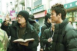 世紀の大作を手がける堤幸彦監督(左)