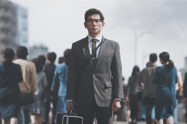八月の声を運ぶ男