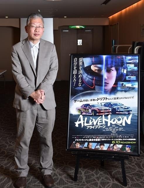 インタビューに応じた椿原敦一郎氏