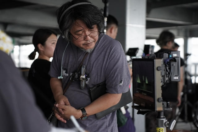 メイキング写真より。城定秀夫監督。